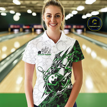 Load image into Gallery viewer, Female model wearing a white bowling polo shirt at the lane with green camo-inspired bowling graphics and subtle ball details.