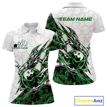 Load image into Gallery viewer, Front and back views of a white womens bowling polo shirt showcasing bowling ball and pin artwork with sharp green camo streaks.