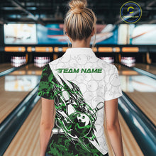 Load image into Gallery viewer, Back view of a female model in a white bowling quarter-zip shirt displaying green camo streak accents and bowling motifs.