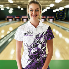 Load image into Gallery viewer, Female model wearing a white bowling polo shirt at the bowling lane with purple camo bowling artwork and faint ball patterns.