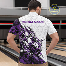 Load image into Gallery viewer, Front view of a male model in a white bowling quarter-zip shirt featuring purple camo bowling artwork and a subtle bowling ball pattern.