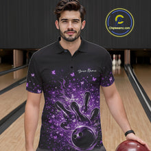 Load image into Gallery viewer, Male model in a black and purple bowling polo shirt at the bowling lane with flames and butterfly accents.