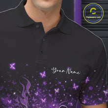 Load image into Gallery viewer, Close-up left chest detail of a black and purple bowling polo shirt featuring sparkly butterflies and flame accents.