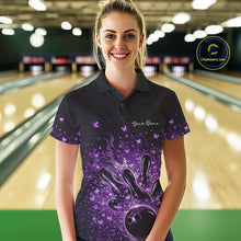 Load image into Gallery viewer, Female model in a black and purple bowling polo shirt at the bowling lane with flames and butterfly accents.