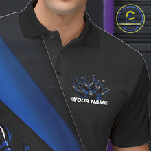 Load image into Gallery viewer, Close-up view of the left chest area of a black and blue bowling polo shirt featuring a flame bowling ball and pins design detail.