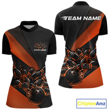 Load image into Gallery viewer, Womens quarter zip bowling shirt mockup, front and back view in black and orange featuring flaming bowling ball striking pins dynamic artwork