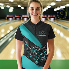 Load image into Gallery viewer, Female model front view inside bowling center wearing black and turquoise blue quarter zip shirt with flame bowling strike artwork