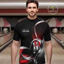 Load image into Gallery viewer, Male model in a bowling lane wearing a black and red quarter zip shirt with honeycomb design and a heart-framed bowling strike graphic.