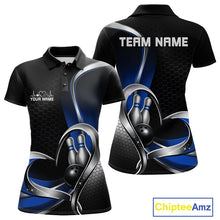 Load image into Gallery viewer, Front and back view of a womens bowling polo shirt mockup in black and blue, featuring a honeycomb pattern with a heart-shaped design around a black bowling ball and pins.