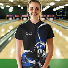 Load image into Gallery viewer, Female model in a bowling alley wearing a black and blue quarter zip shirt, showing a honeycomb pattern and heart motif surrounding a bowling ball and pins.
