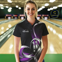 Load image into Gallery viewer, Female model in a bowling lane wearing a black and purple polo shirt with honeycomb accents and a heart-framed bowling strike graphic.