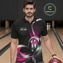 Load image into Gallery viewer, Male model in a bowling lane wearing a black and pink polo shirt with honeycomb texture and a heart-framed bowling strike illustration.