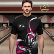 Load image into Gallery viewer, Male model in a bowling lane wearing a black and pink quarter zip shirt with honeycomb texture and a heart-framed bowling strike graphic.