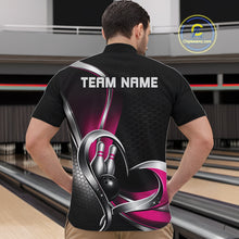 Load image into Gallery viewer, Male model at a bowling alley wearing a black and pink quarter zip shirt, featuring honeycomb pattern and a heart-shaped bowling action illustration.
