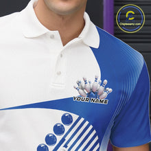 Load image into Gallery viewer, Close-up of the left chest area of a white and blue bowling polo shirt, featuring a dynamic bowling strike graphic with wavy geometric stripes.