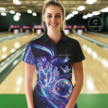Load image into Gallery viewer, Front view of a female model in a black bowling polo featuring a starry galaxy background, neon swirls, and hologram butterfly graphics