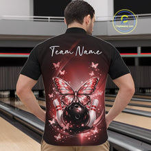 Load image into Gallery viewer, Front view of a male model in a bowling alley wearing a red quarter-zip shirt showcasing luminous butterflies around a bowling ball.