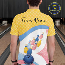 Load image into Gallery viewer, Back view of a male model in a bowling venue wearing a polo shirt showcasing colorful bowling-themed patchwork artwork.