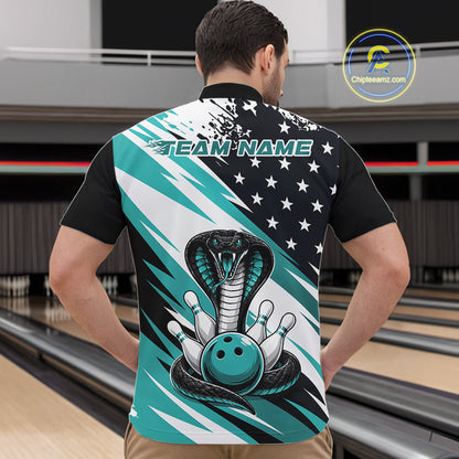Back view of a man in a bowling alley wearing a black, white, and blue american flag cobra-themed shirt with “Team Name” across the shoulders.