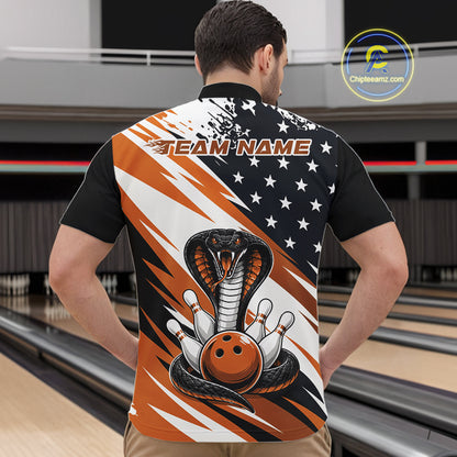 Back view of a man in a bowling alley wearing a black, white, and orange american flag cobra-themed shirt with “Team Name” across the shoulders.