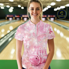 Load image into Gallery viewer, Front view of a female model in a bowling venue wearing a quarter-zip shirt adorned with glitter butterflies, diamond accents, and bowling-themed artwork.