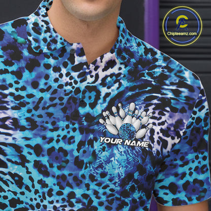 Close-up of a yellow, brown, and black leopard-print bowling shirt with a chest graphic showing pins, a patterned bowling ball, and “Your Name.”