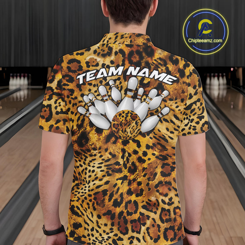 Back view of a man wearing a yellow, brown, and black leopard-print bowling shirt with “Team Name” above bowling pins and a patterned ball.
