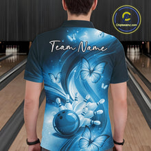 Load image into Gallery viewer, Back view of a blue bowling polo showcasing a bowling strike scene surrounded by butterfly details.