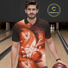 Load image into Gallery viewer, Male model wearing an orange bowling polo in a bowling center with bowling strike graphics and butterfly accents.