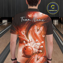 Load image into Gallery viewer, Back view of an orange bowling polo displaying a bowling ball knocking down pins with butterfly details.