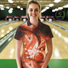 Load image into Gallery viewer, Female model at the bowling lane wearing an orange bowling polo with bowling strike artwork and butterfly details.