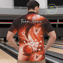 Load image into Gallery viewer, Front view of a mens orange bowling quarter-zip showcasing a bowling ball knocking down pins surrounded by butterfly graphics.