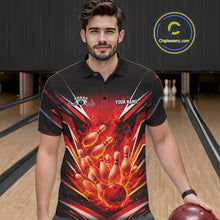Load image into Gallery viewer, Male model wearing a black and red bowling polo inside a bowling center with explosive bowling strike artwork.