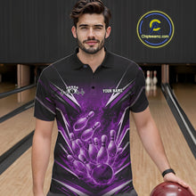 Load image into Gallery viewer, Male model wearing a black and purple bowling polo in a bowling alley featuring dynamic flaming bowling graphics.