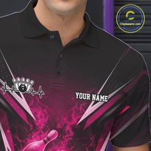 Load image into Gallery viewer, Left chest close-up on a black and pink bowling polo featuring a flaming bowling ball and pin motif.