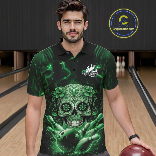 Male model wearing a black and green bowling polo shirt at a bowling lane with sugar skull and bowling strike graphics.