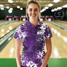 Load image into Gallery viewer, Front view of a male model in a bowling alley wearing a bowling polo shirt featuring a white paint splatter design on a blue sportswear shirt.
