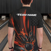 Load image into Gallery viewer, Back view of a male model in a bowling alley wearing a black and orange polo featuring a flaming bowling ball and pin impact design.