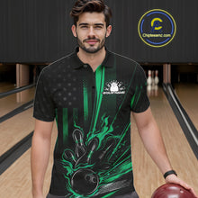 Load image into Gallery viewer, Male model wearing a black and green bowling polo shirt at a bowling lane with patriotic bowling strike artwork and flag-inspired details.