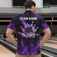 Load image into Gallery viewer, Front view of a male model in a bowling venue wearing a black and purple quarter-zip shirt showcasing a bowling ball and scattered pin motif.