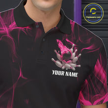 Load image into Gallery viewer, Close-up of a black and pink bowling polo shirt left chest featuring bowling strike graphics with a fiery background.