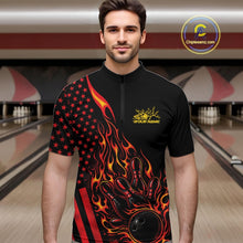 Load image into Gallery viewer, Male model at a bowling lane wearing a black bowling quarter-zip shirt with a red and orange flaming bowling ball striking pins and patriotic American flag artwork.