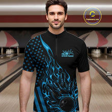 Load image into Gallery viewer, Male model wearing a black bowling quarter-zip shirt at a bowling lane with blue flame bowling strike artwork and patriotic graphics.
