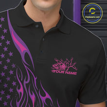 Load image into Gallery viewer, Close-up of the left chest on a black bowling polo shirt featuring a pink and purple flaming bowling ball striking pins with patriotic styling.