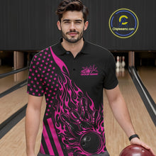 Load image into Gallery viewer, Male model wearing a black bowling polo shirt at a bowling lane with pink flame bowling strike graphics and patriotic styling.