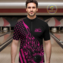 Load image into Gallery viewer, Male model wearing a black bowling quarter-zip shirt at a bowling lane with pink flame bowling strike artwork and patriotic accents.