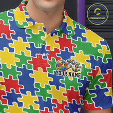 Load image into Gallery viewer, Close-up left chest detail of colorful bowling polo shirt featuring seamless multicolor puzzle pattern design