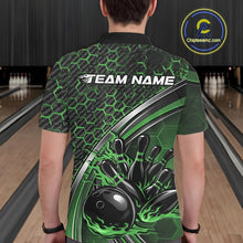 Load image into Gallery viewer, Back view of a male model in a bowling alley wearing a black and green polo shirt, showcasing honeycomb texture and a flaming bowling strike graphic.