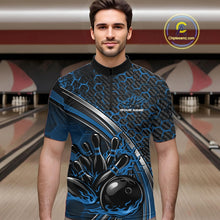 Load image into Gallery viewer, Male model in a bowling lane wearing a black and blue quarter zip shirt with honeycomb texture and a flaming bowling ball hitting pins graphic.