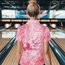 Load image into Gallery viewer, Back view of a female model wearing a pink quarter zip bowling shirt featuring a bowling ball striking pins with butterfly accents.